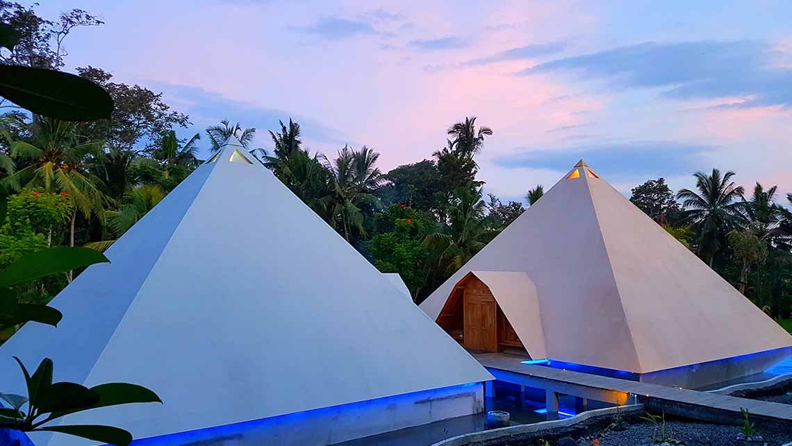 Pyramids of Chi — two white pyramids at dusk, Ubud Bali